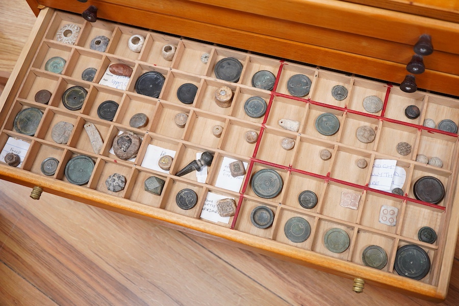 A collection of mainly Medieval to 19th century bronze and lead imperial circular trade weights, with some Viking and Roman examples, stamped with Royal Cyphers, weights, the dagger assay mark for London, the ewer mark,